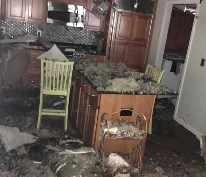 Kitchen after a fire and water from fire department cause damage